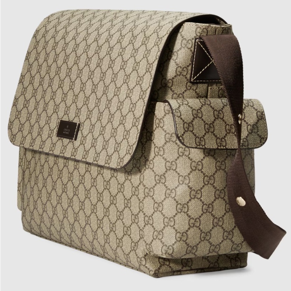 Gucci Diaper Bag. New w/o tags - never used. Dust bag included.